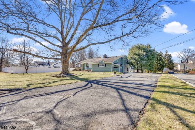 Discover this charming front split level home in the desirable Piedmont Section of Bound Brook.