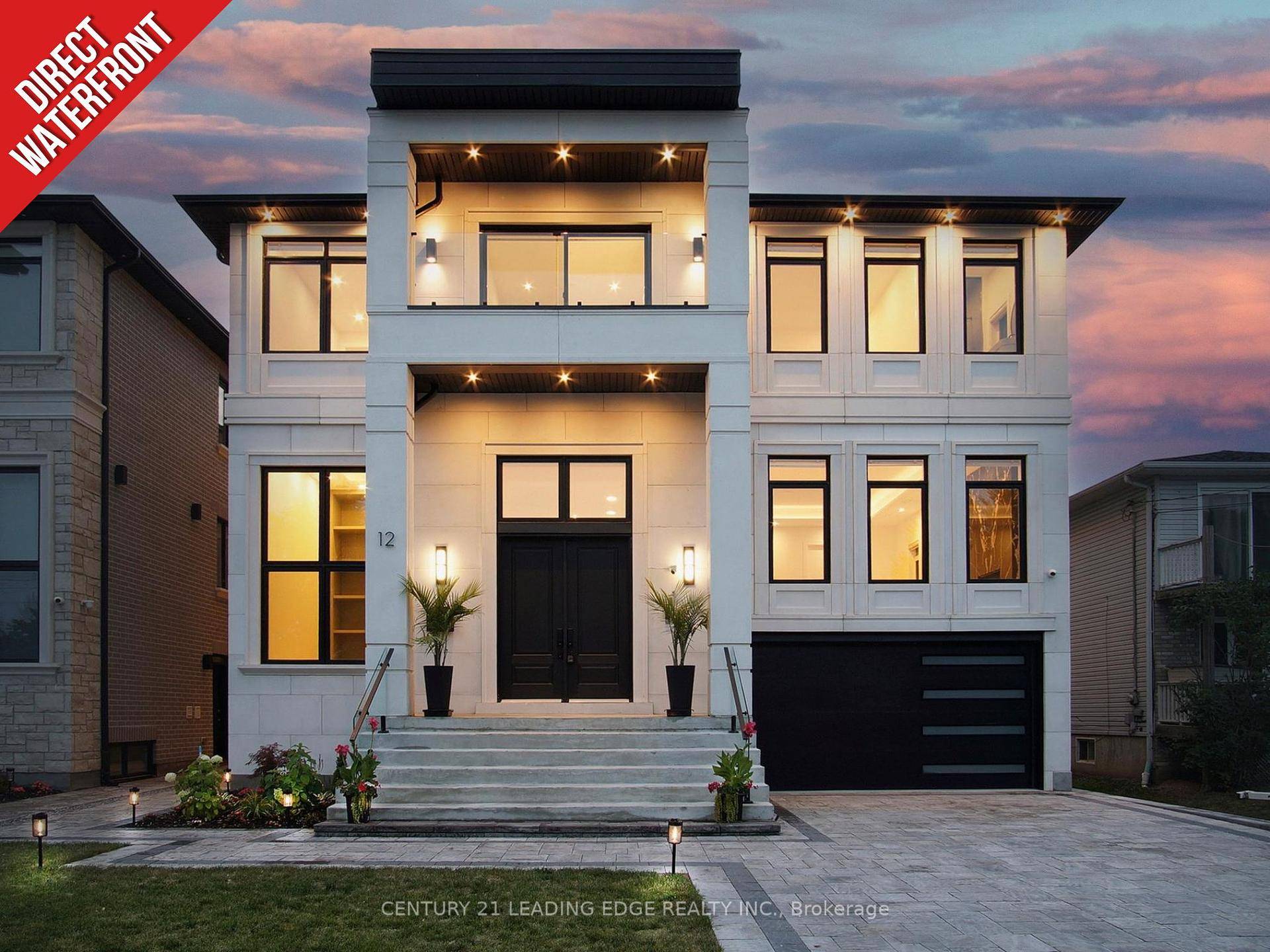 Experience timeless design and modern sophistication in this custom built luxury waterfront estate with over 5, 700sqft of finished living space !