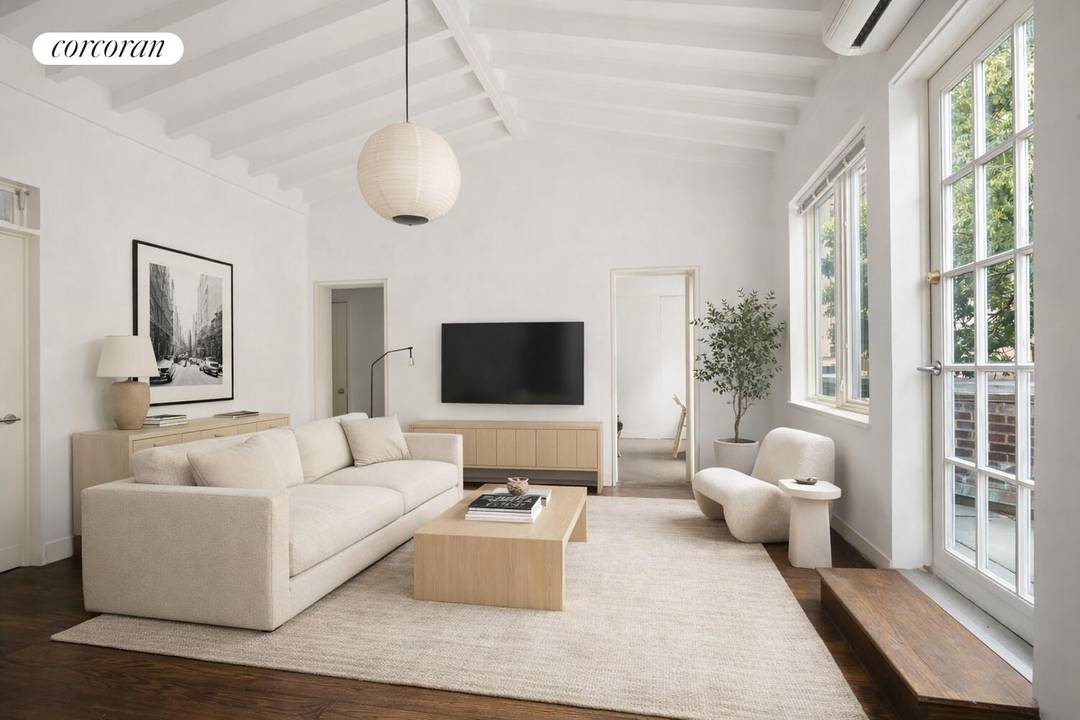 A Rare Front Terrace Residence in the Heart of Downtown Perched within a classic elevator brownstone, this exceptional one bedroom home offers a truly rare and coveted feature an expansive, ...