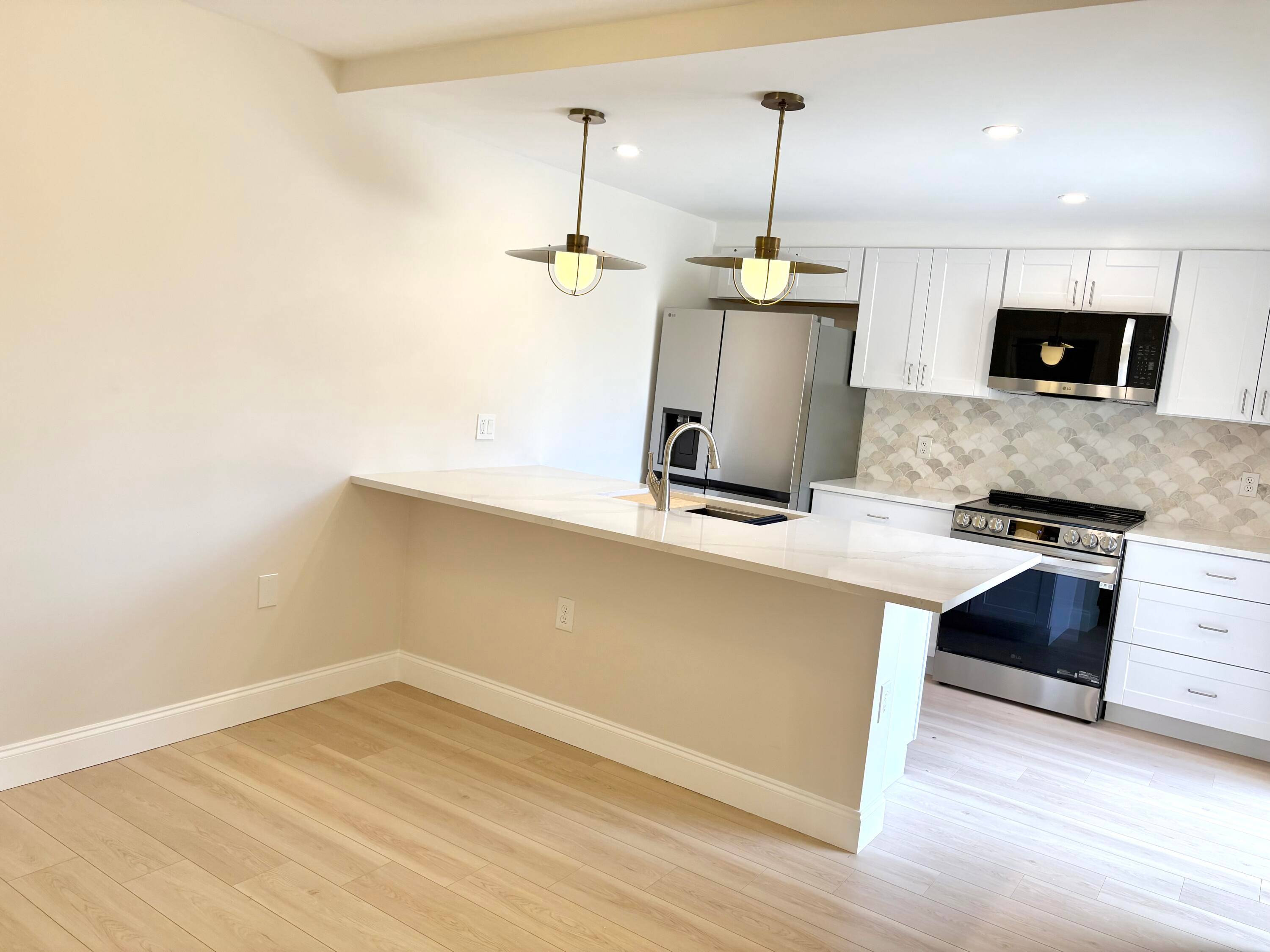 All New New New ! In this townhouse A C, kitchen and appliances, bathroom and laundry room, luxury flooring, paint and popcorn removal all done with upgrades galore.