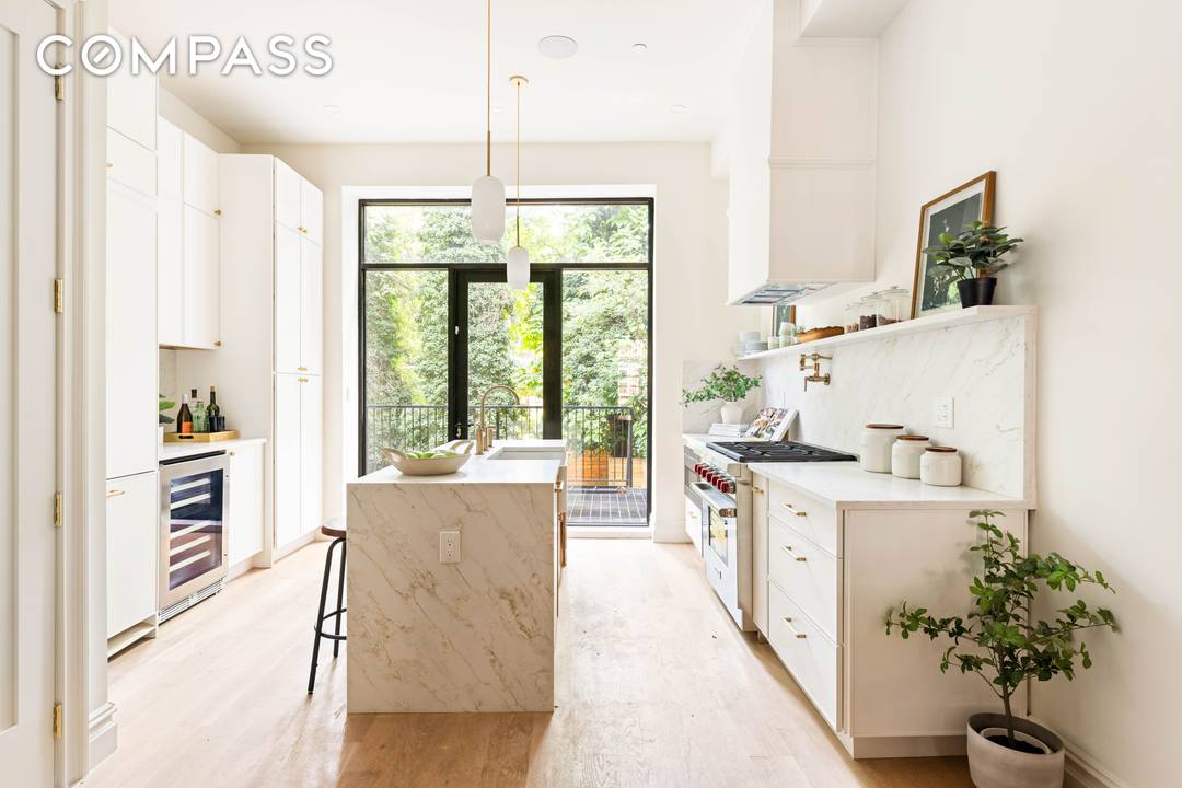 Welcome to 106 Decatur Street, a beautifully renovated 1899 brownstone that masterfully blends timeless elegance with modern sophistication.