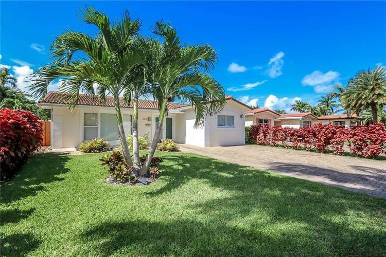 Beautifully updated 4BR 3BA home in the heart of desirable Hollywood Lakes, just one block from South Lake !
