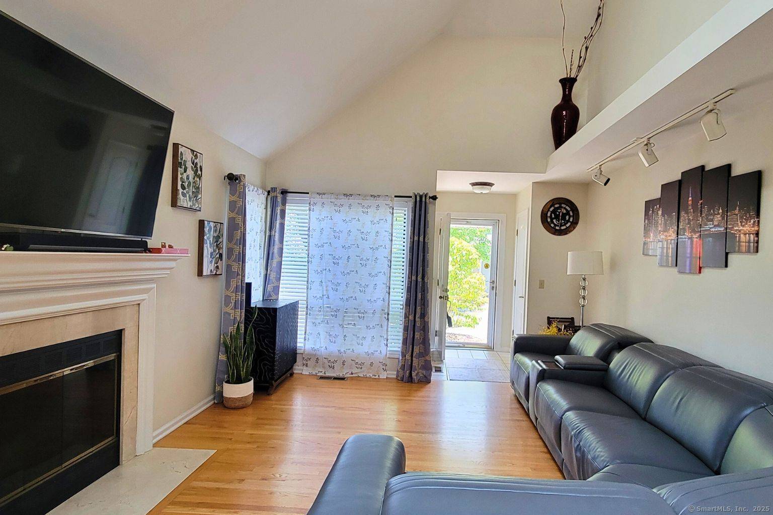 Corner open floor townhouse with 2 car attached garage.
