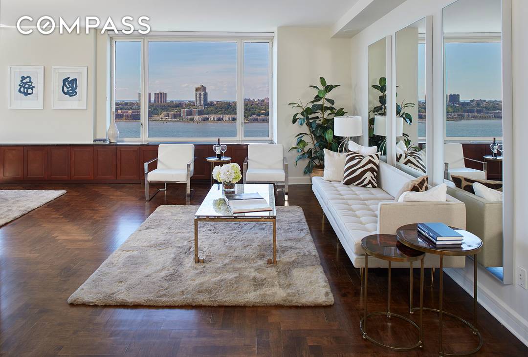 Spacious sun filled tranquil combination 4 bedroom, 3 bathroom plus home office condominium with sweeping unobstructed Hudson River views located on West 70th Street.