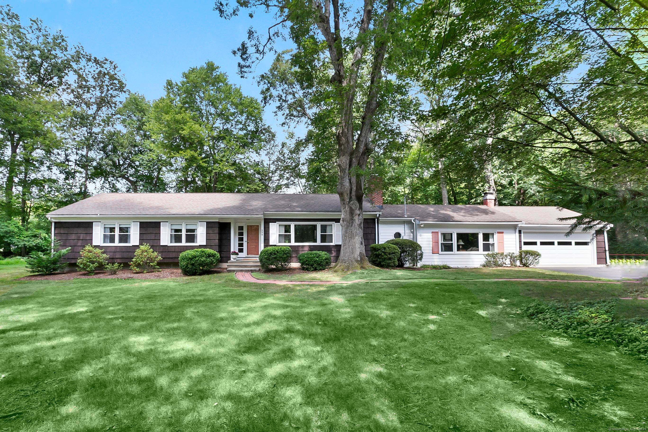 Welcome to this meticulously maintained 4 bedroom, 2 bath ranch, perfectly situated on a picturesque acre in one of North Stamford's most desirable neighborhoods.
