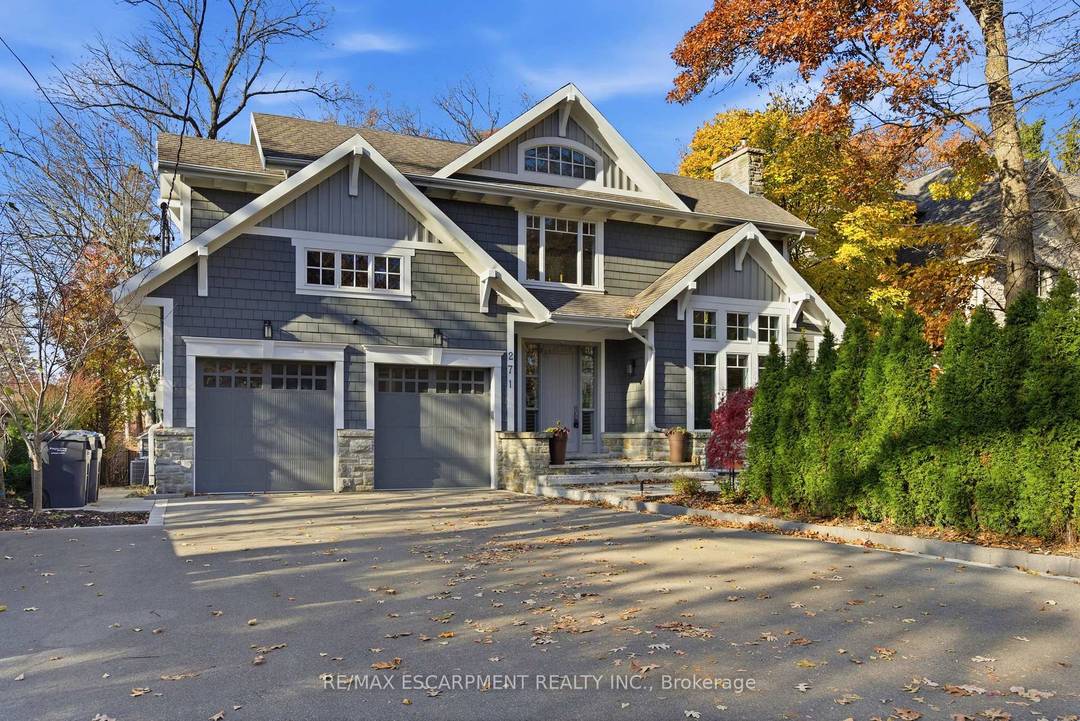 Stunning custom David Small home in the desirable Mineola neighbourhood, featuring a fully finished lower level in law suite with a private entrance, full kitchen, spacious living area, bedroom with ...