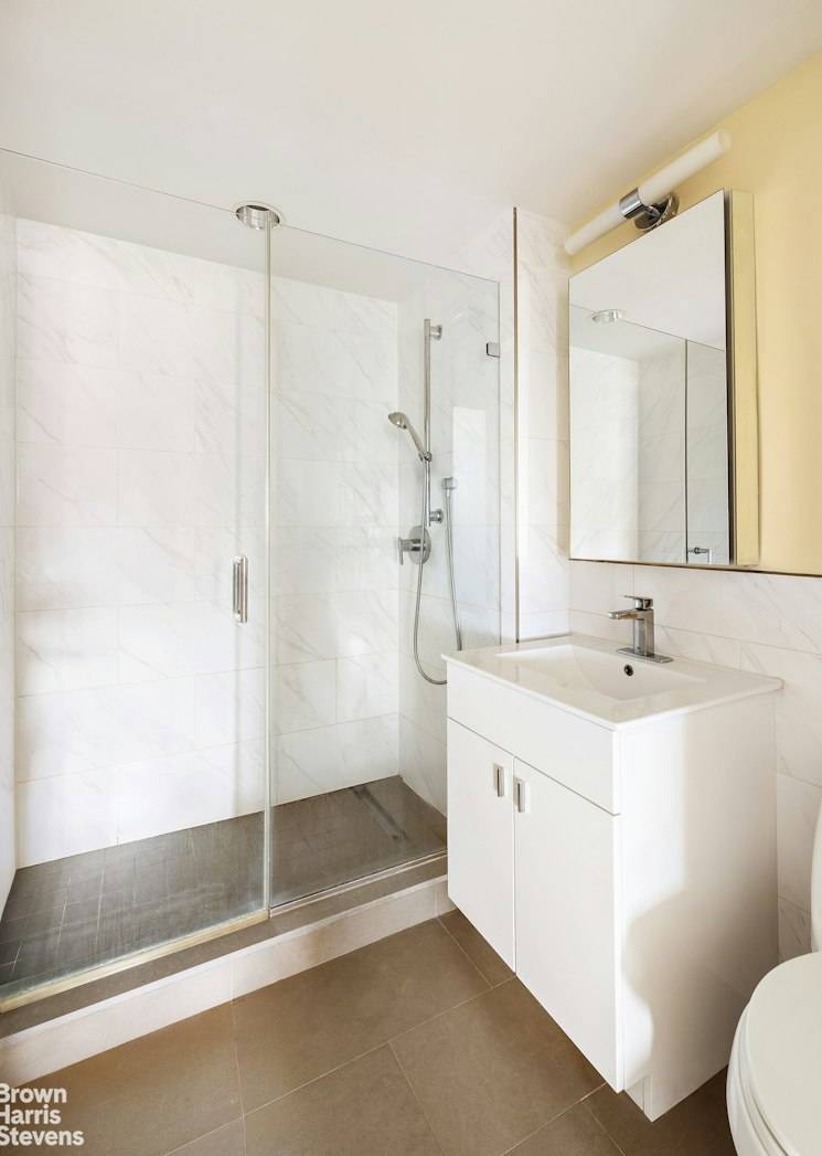 Bright and sunny west facing 2 bedroom, 2 bathroom home at The Aurum, located on the corner of Adam Clayton Powell Jr.