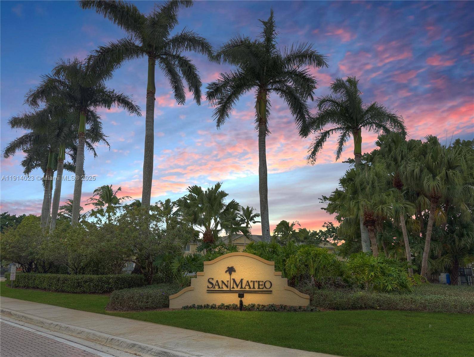 Beautifully updated townhome in the gated San Mateo community featuring newly renovated waterproof vinyl plank flooring throughout, modern bathrooms, and a sleek kitchen with quartz countertops and matching white appliances ...