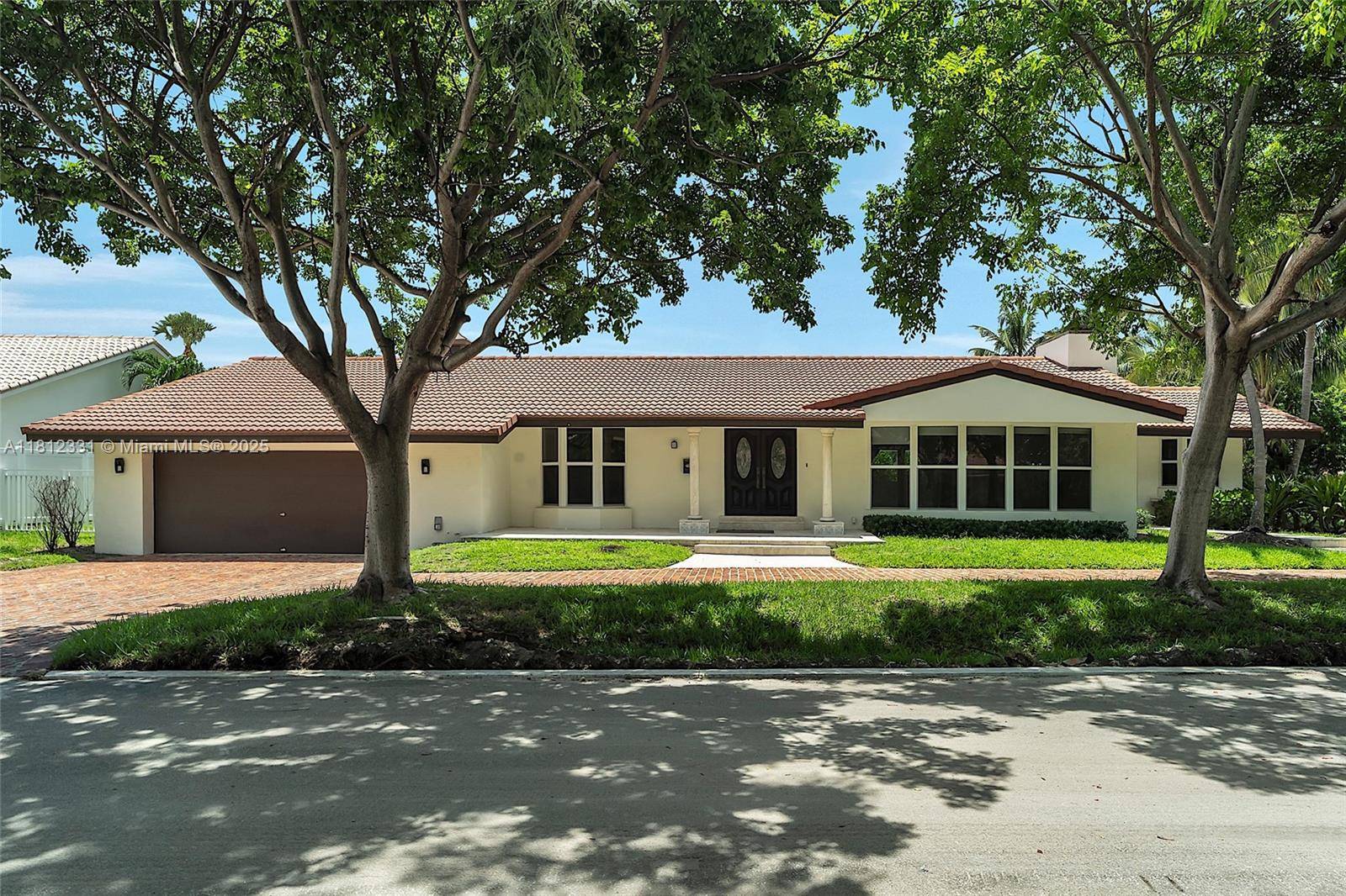 Steps from sand and sea an elegantly upgraded home in the prestigious, guard gated village of Sea Ranch Lakes, one of South Florida s most exclusive enclaves.