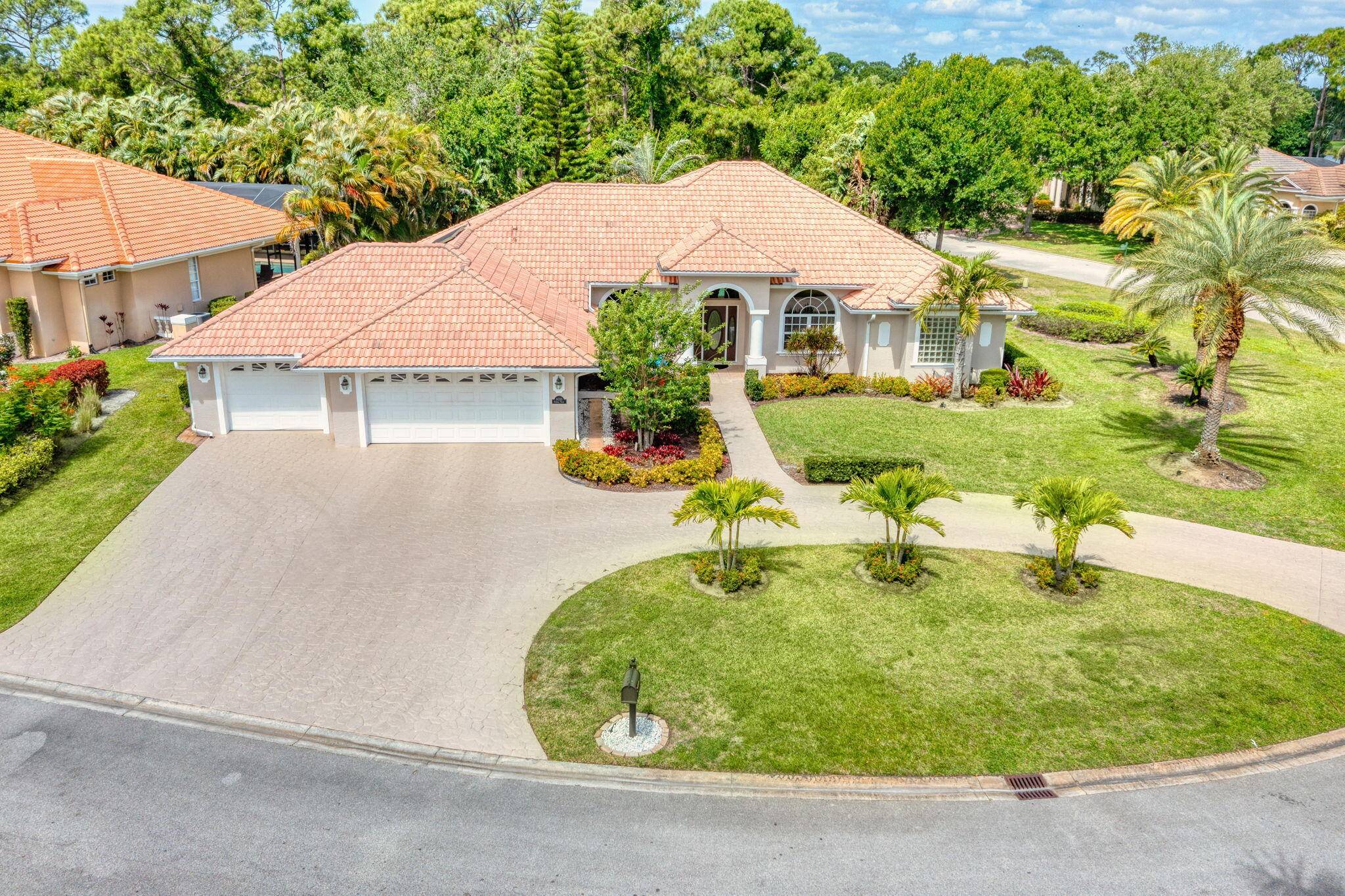 Welcome to 8055 Kiawah Trace, a beautifully maintained home nestled in the desirable PGA Village community of Port St.