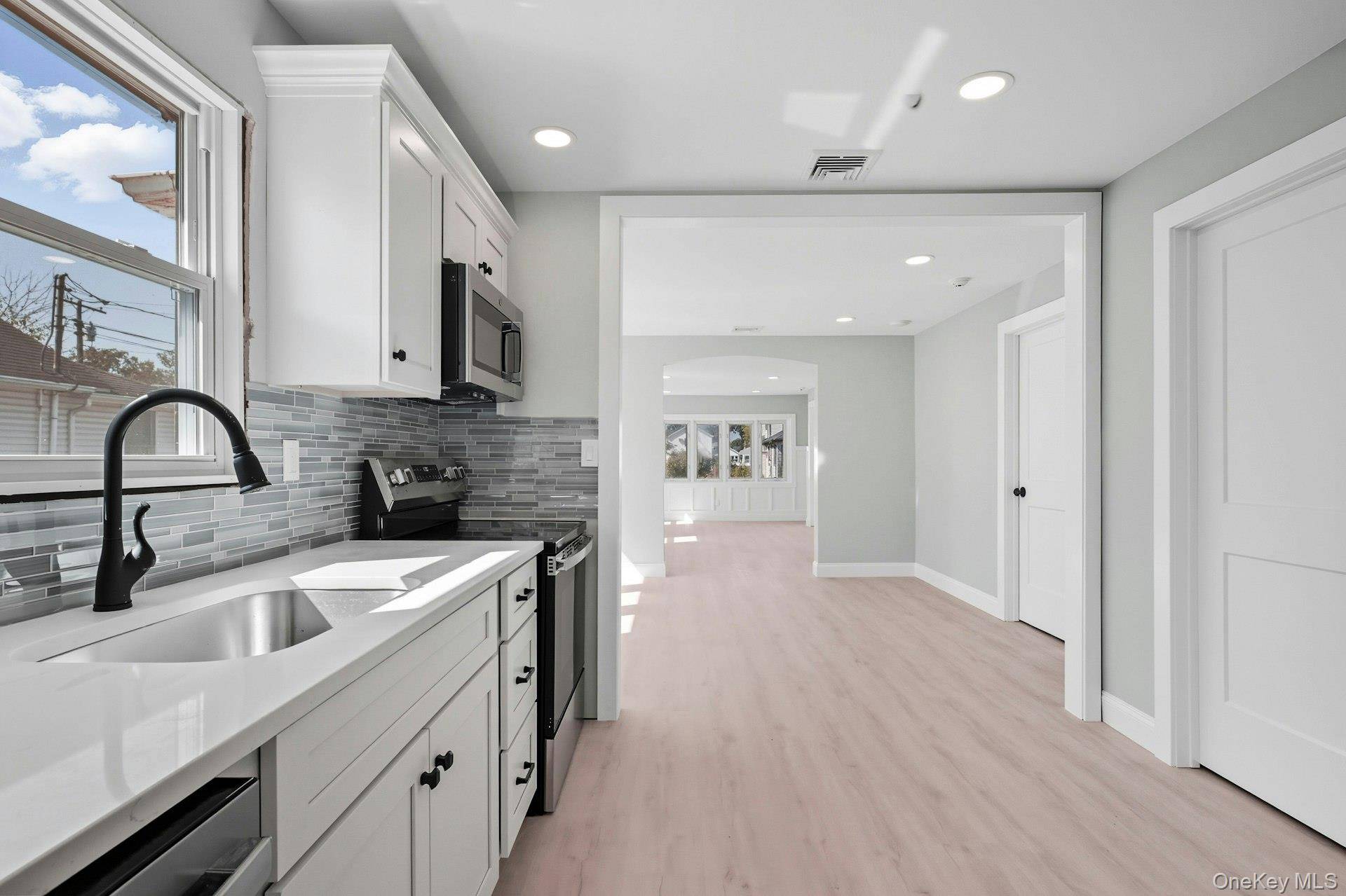 This totally renovated 3 bedroom, 2 bath home offers style, comfort, and space.