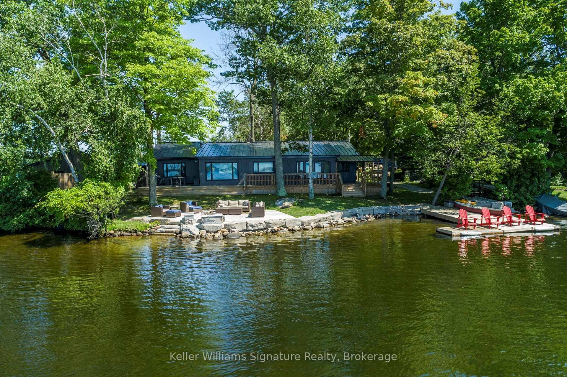 Welcome to Your Own Private Point on Balsam Lake, Featuring Two Luxury Cottages on One Lot !