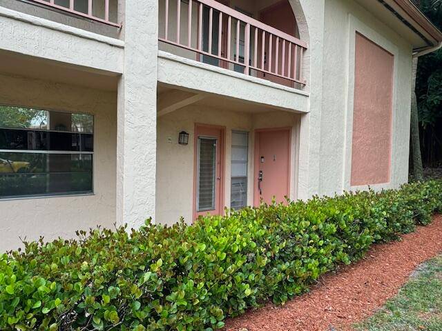 THIS IS A RARE FIRST FLOOR CORNER CONDO AND IT IS IN EXCELLENT CONDITION WITH 3 BEDROOMS AND 2 BATHROOMS WITH ONE BEDROOM USED AS A DEN.
