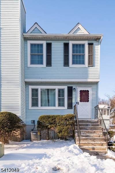 Mint condition end unit townhouse 1st floor featuring spacious living room, great size eat in kitchen with all appliances and wood cabinets all around, convenient stackable laundry, front load washer ...