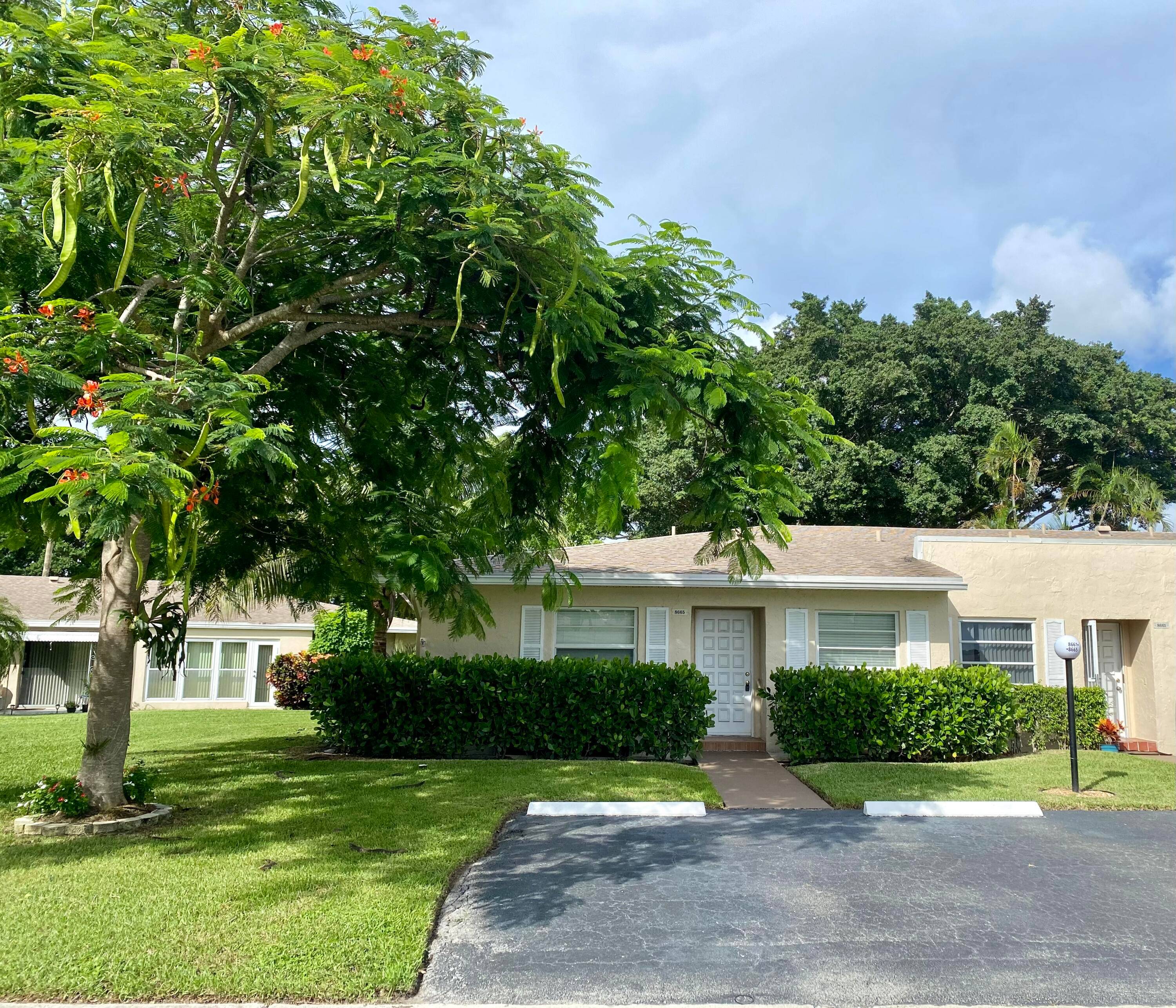 BEAUTIFULL SPACIOUS VILLA FEATURING 2 BED 2 BATHS SPLIT PLAN EXTRA STORAGE WALK IN CLOSET BRAND NEW A C SYSTEM INSTALLED IN MARCH 2025 HURRICANE IMPACT WINDOWS NEW FLOORING IS ...
