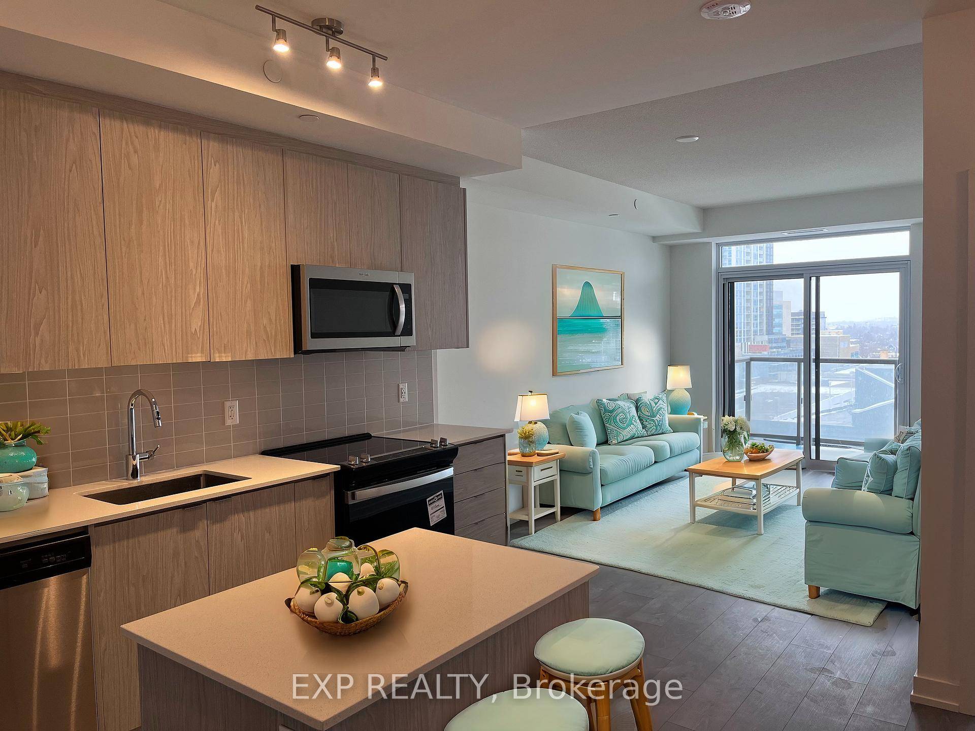 Experience modern urban living in the heart of downtown Kitchener at 55 Duke Street West, Unit 906.