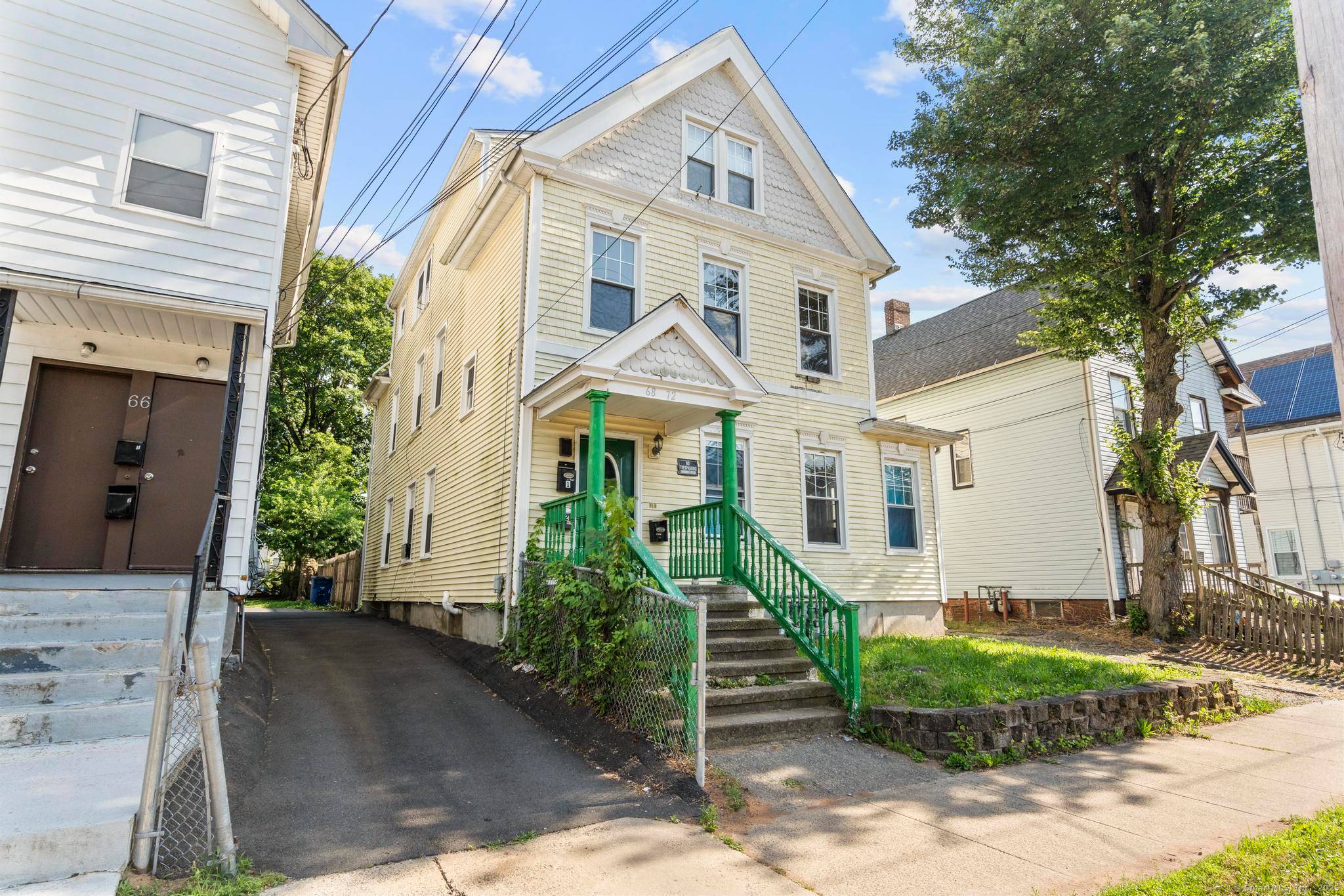 Welcome to this three family home located in the heart of the Newhallville neighborhood of New Haven.