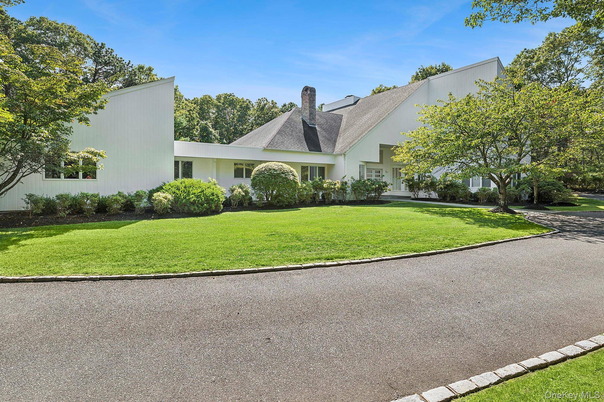 This stunning property boasts a chef s kitchen with luxurious marble countertops, and Moroccan tile floors, perfect for culinary enthusiasts.