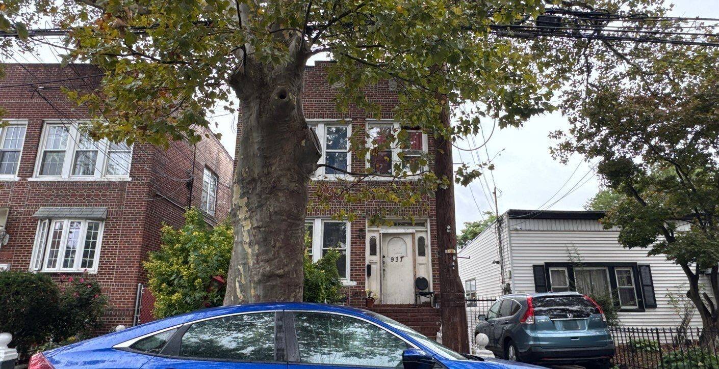 This Colonial Style 2 Family Home Features 6 Bedrooms, 3 Full Baths and Eat In Kitchen.