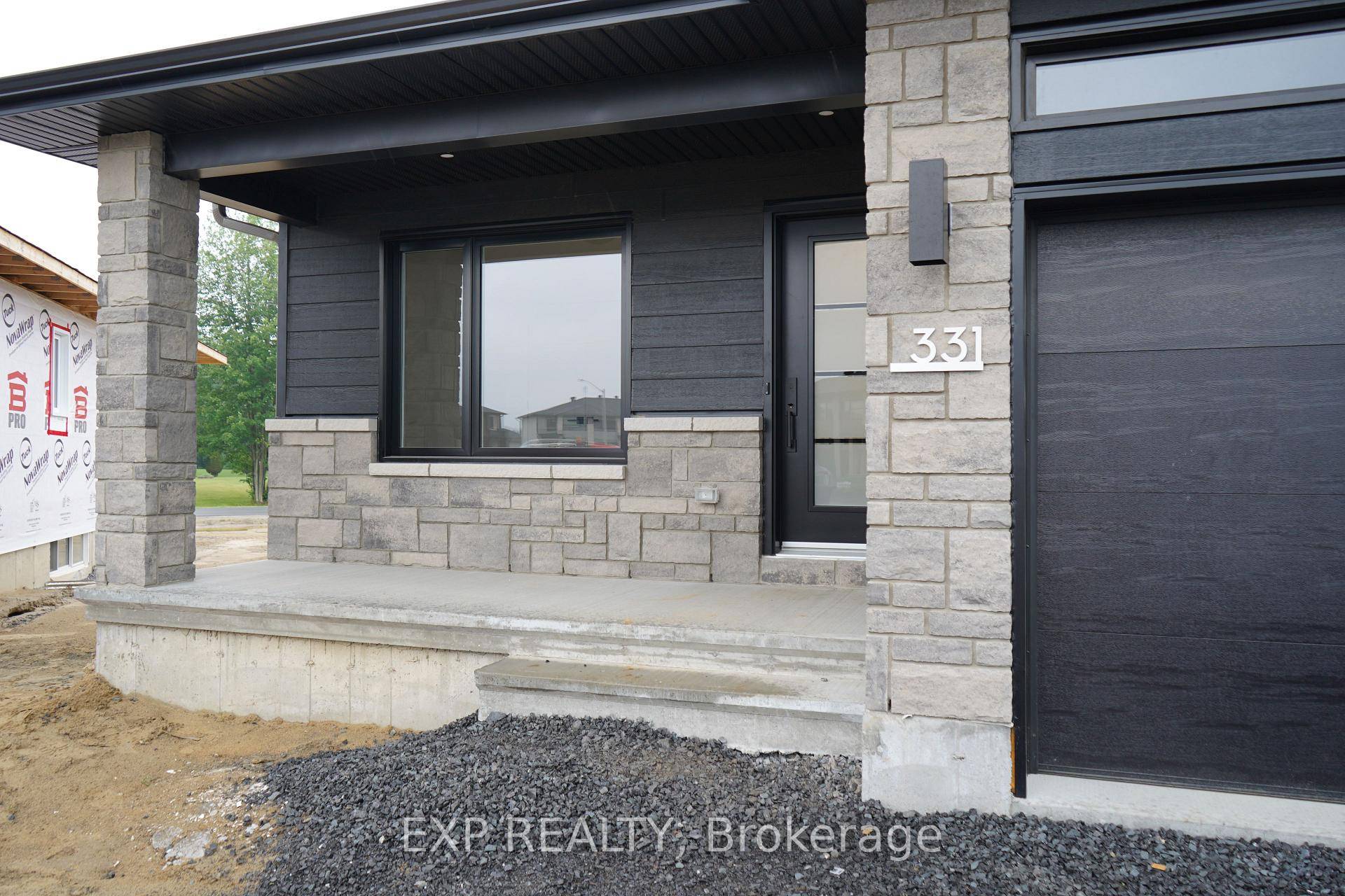 Welcome to the Blue Mountain I, a beautifully designed open concept bungalow that effortlessly blends style and functionality for the perfect living experience.