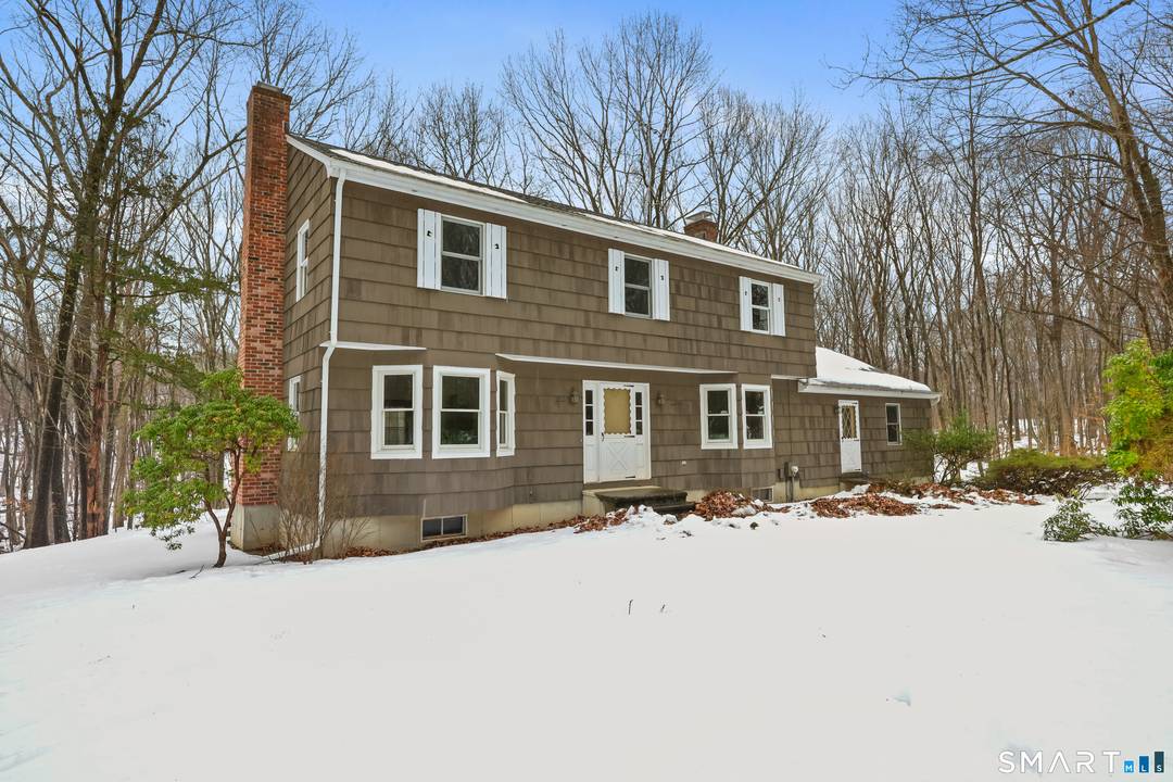 Privately set on a serene back lot, this spacious 4 Bedroom, 2.