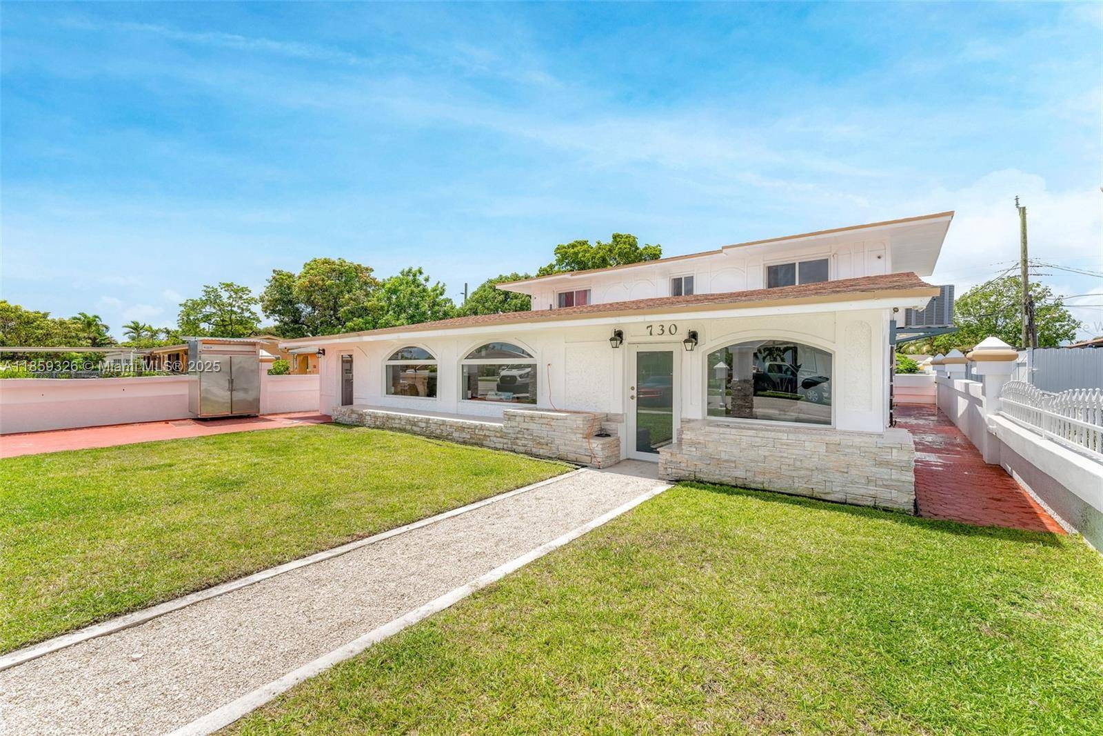 Fully remodeled 6 bedroom, 4 bath home offering exceptional versatility.