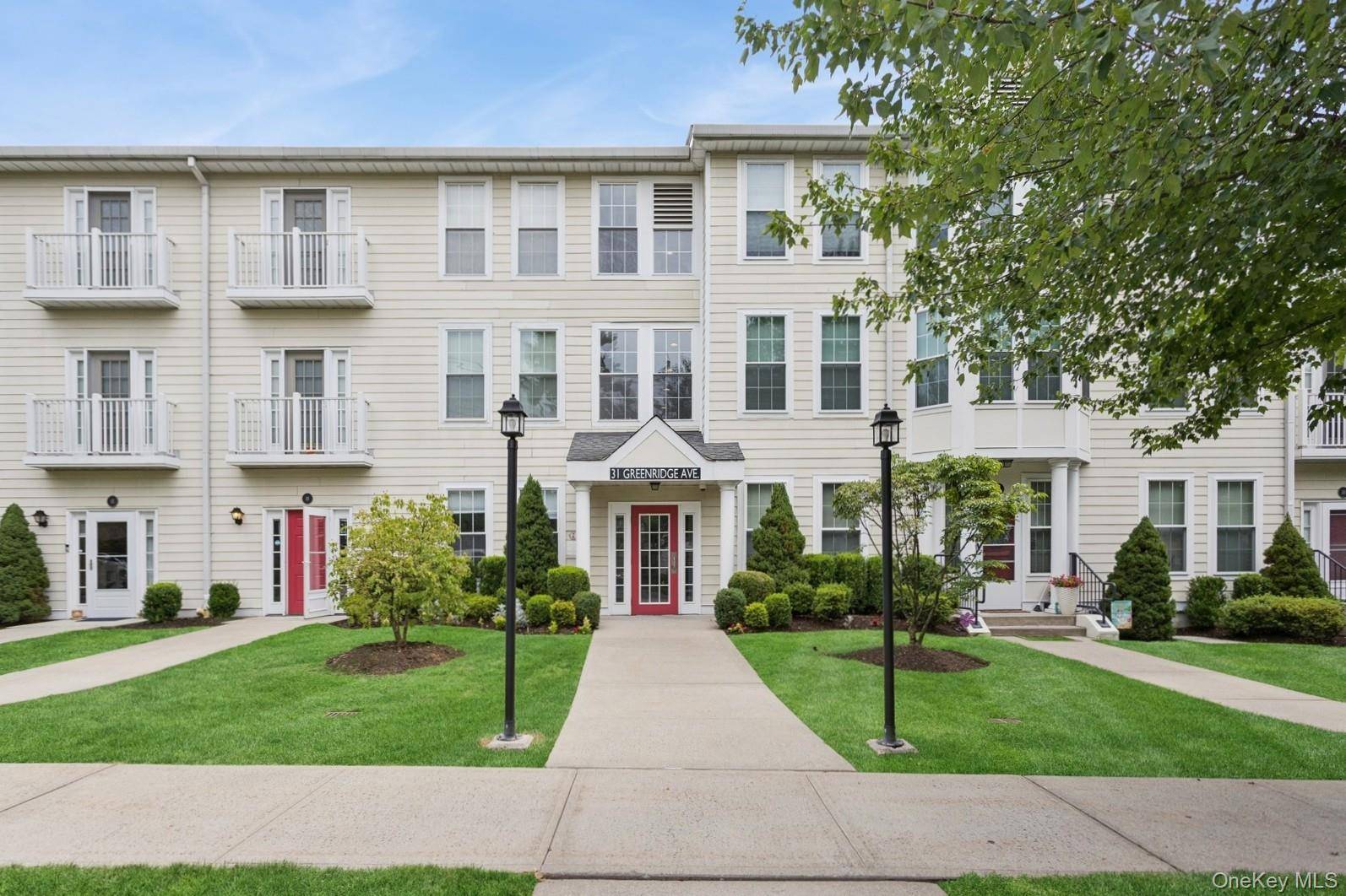A top floor 2 bedroom unit at Jefferson Place Low Rise building offering private setting with tree top views.