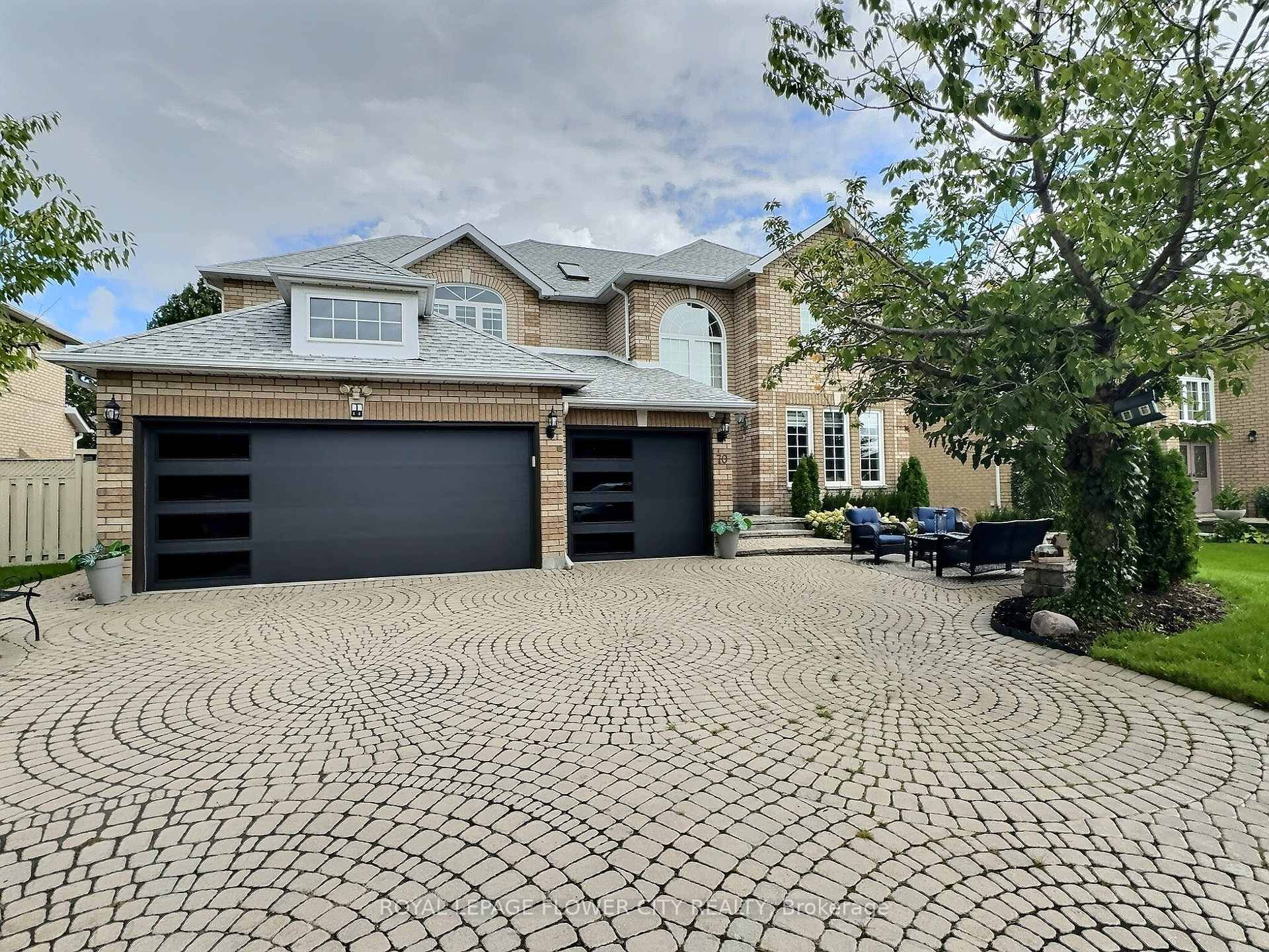 S T U N N I N G executive home on a 67 ft wide lot with 3 car garage and finished basement with ensuite and full kitchen, located in ...