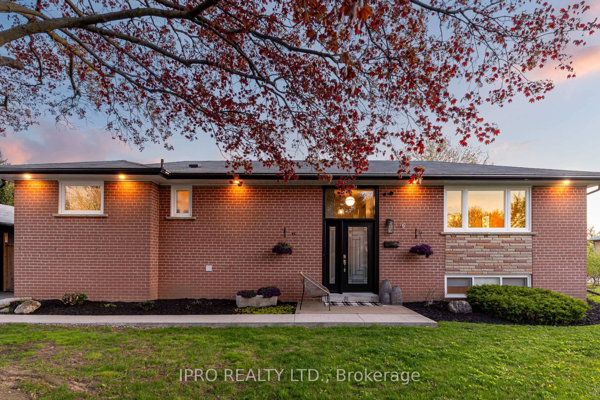 Situated on an oversized corner lot in a family friendly neigbourhood, this all brick bungalow offers a large 1.