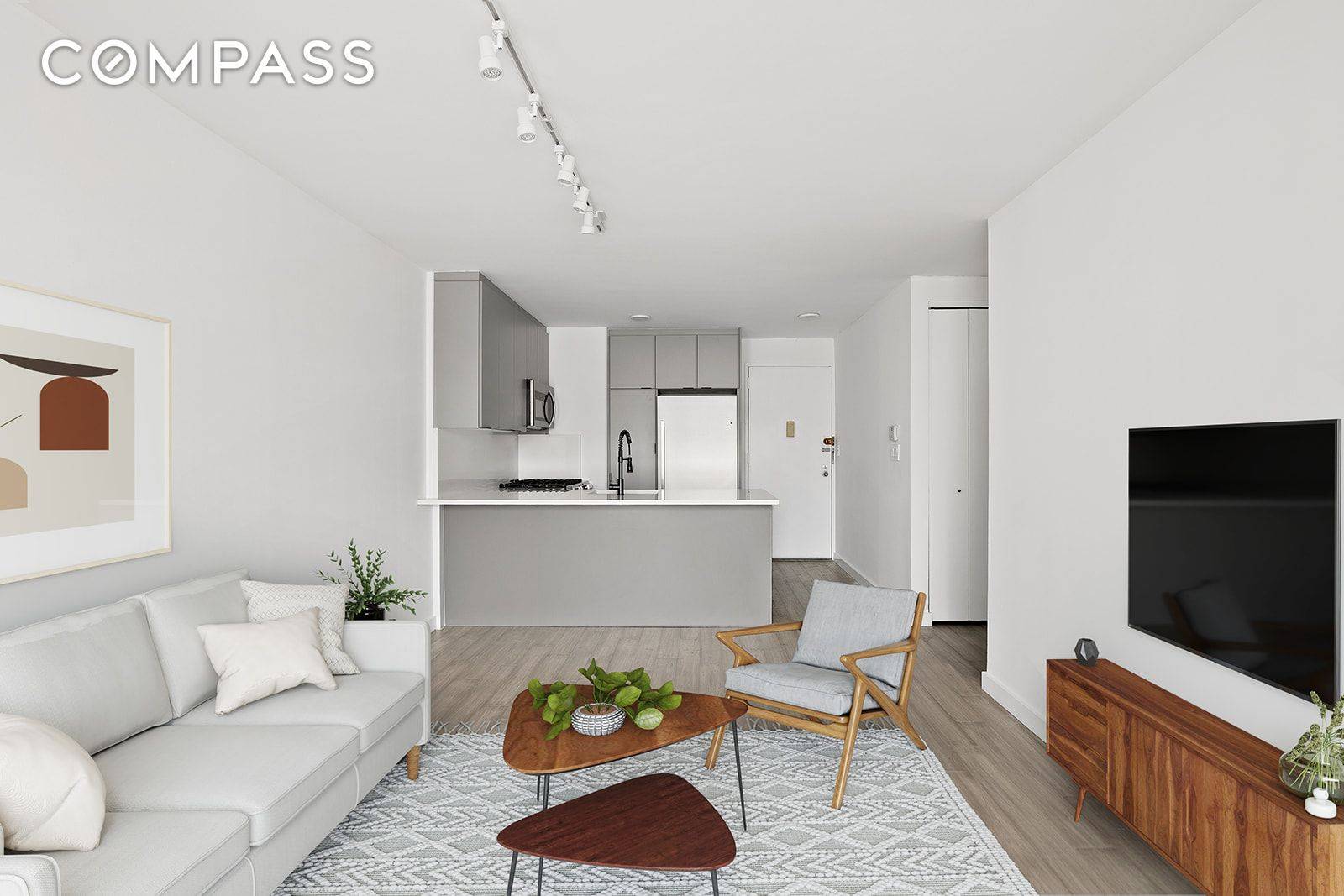 Large 1 bedroom with private balcony and open city views in the heart of Chelsea !