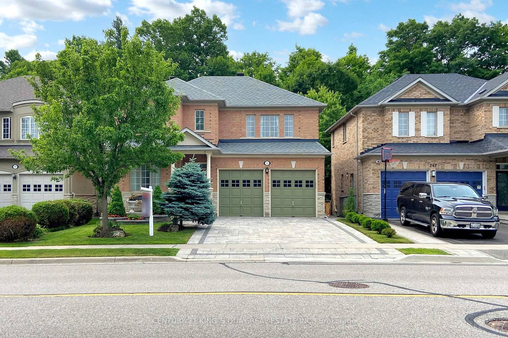 Absolutely Stunning home nestled in a serene ravine setting, surrounded by lush greenery and offering ultimate privacy.