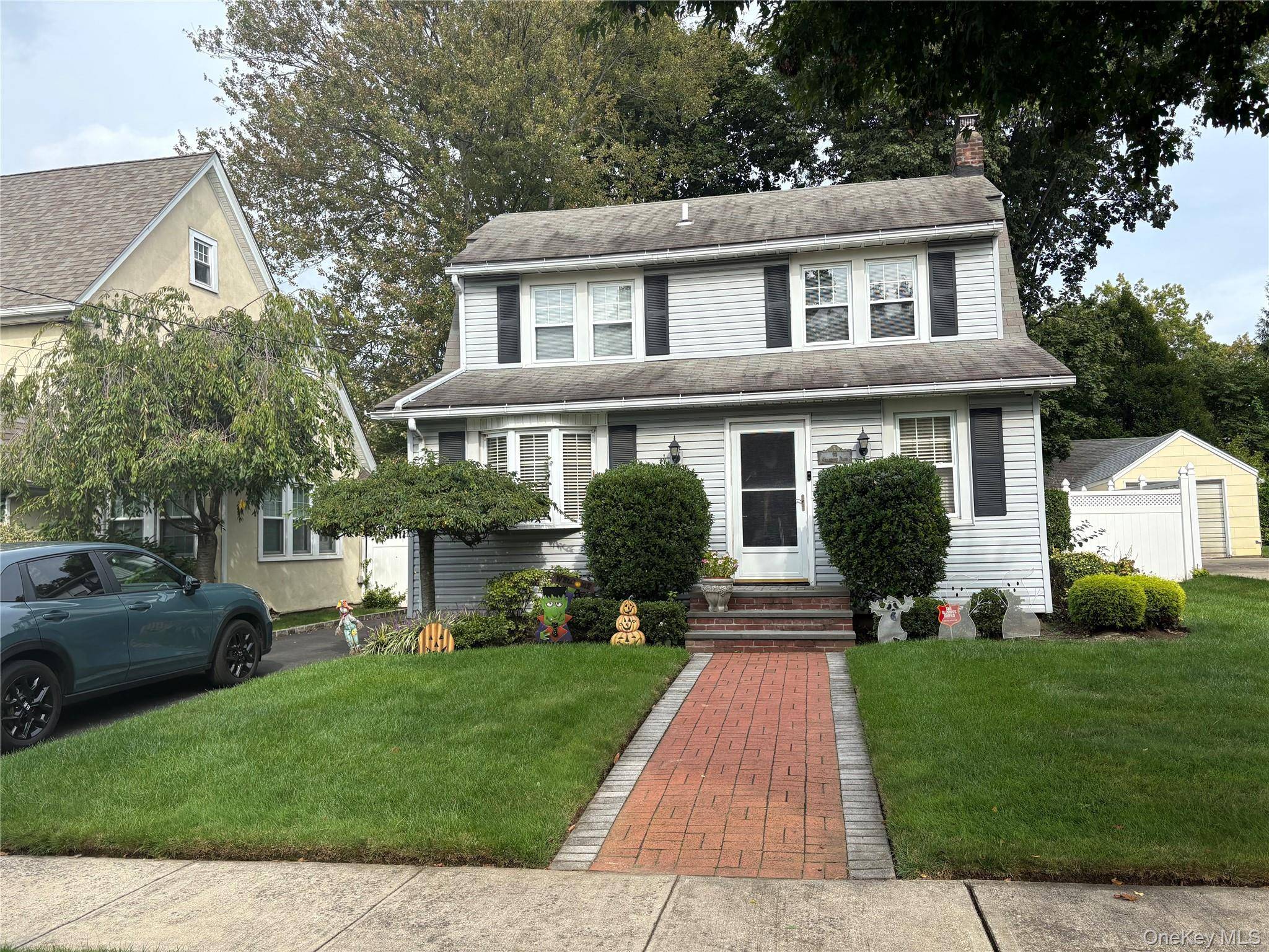 Gorgeous Move Right in ! Mint Condition 3 Bedroom, 2 Full Bath Colonial, Living Room with Gas Fireplace, Formal Dining Room, wood floors throughout.