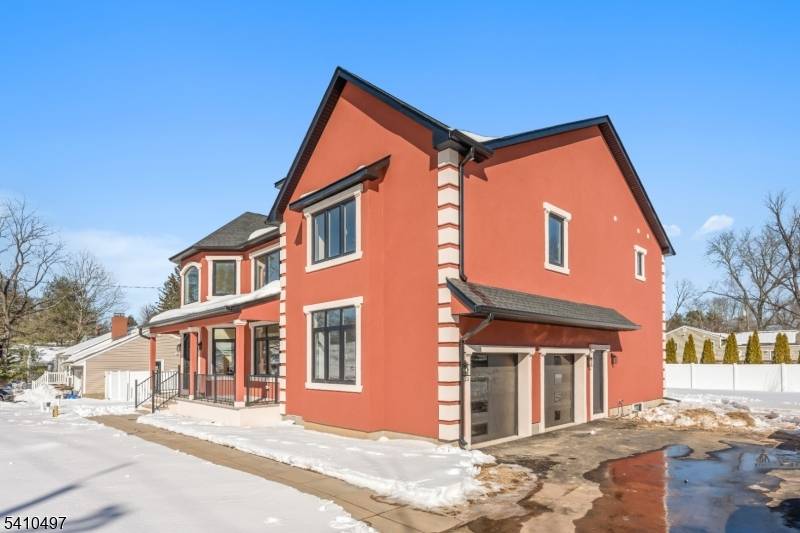 Stunning New Construction in the Desirable Lionshead Lake Section of Wayne !