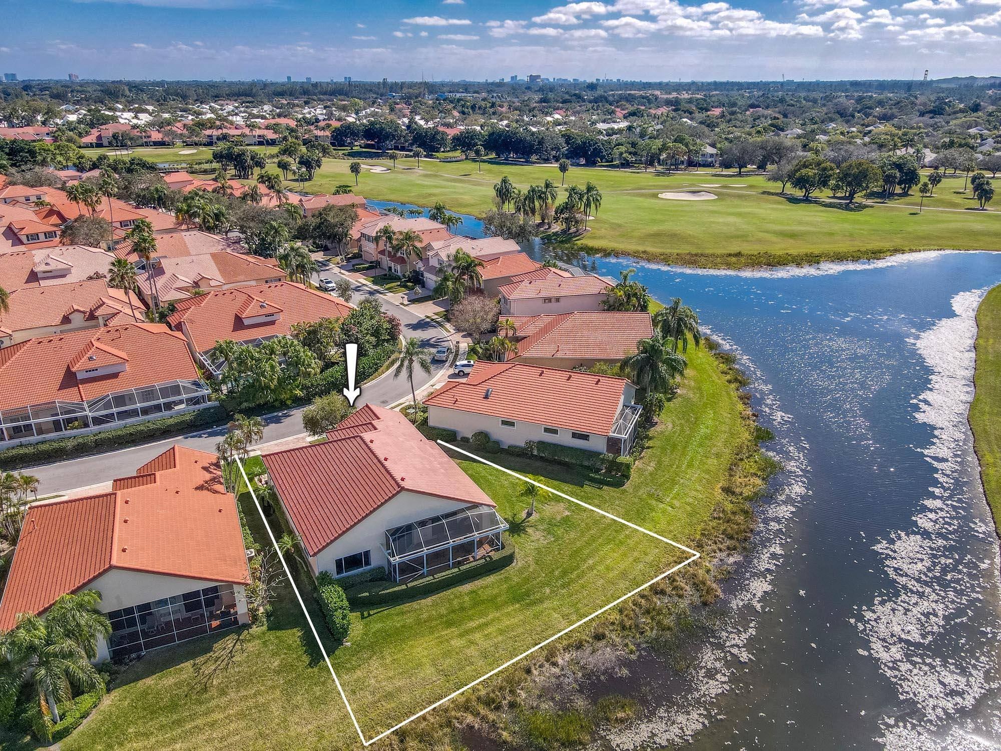 Nestled in the exclusive double gated Monterey Pointe within PGA National, this stunning single story lakefront home offers both privacy and elegance.