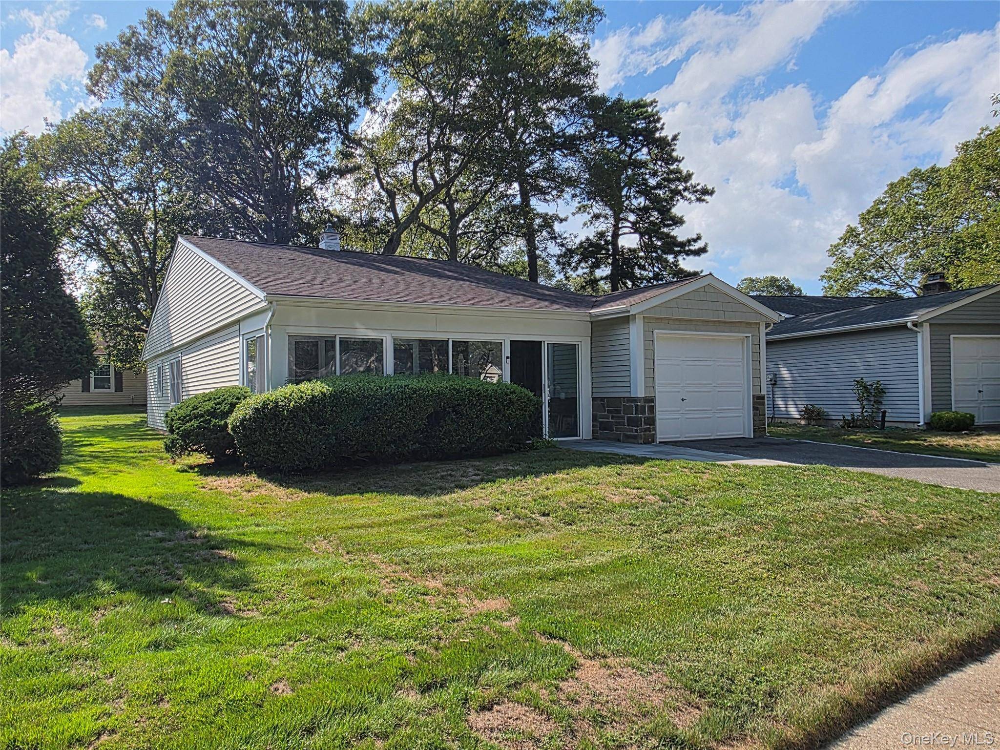 Tucked away in one of the area's most sought after 55 communities is this stunning 2 bedroom 2 full bath Huntington Model.