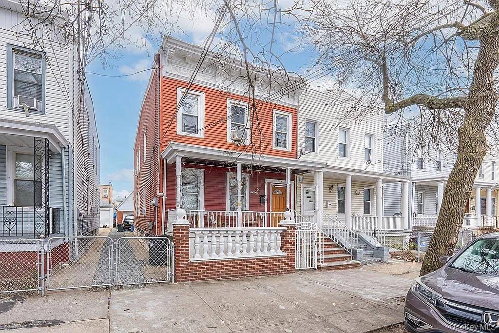 Two family home in a quiet street walking distance to public transportation, schools, house of worship, supermarket.