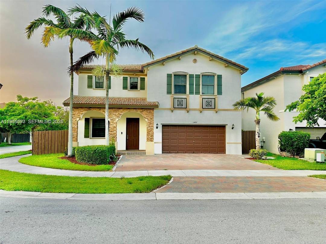 Stunning 4 bedroom, 3 bathroom home built in 2013, perfectly positioned on a premium corner lot in Homestead near Exit 9 of the Florida Turnpike.