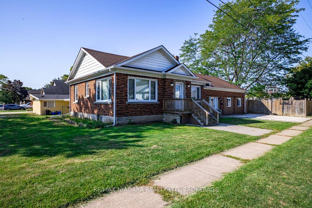 Exceptional opportunity awaits on this spacious corner lot !