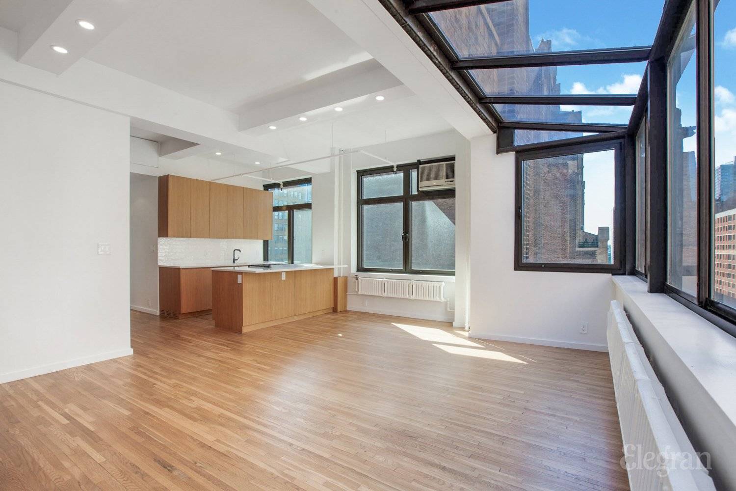 LOVE THE LIGHT IN THIS RARE FIND CORNER LOFT.