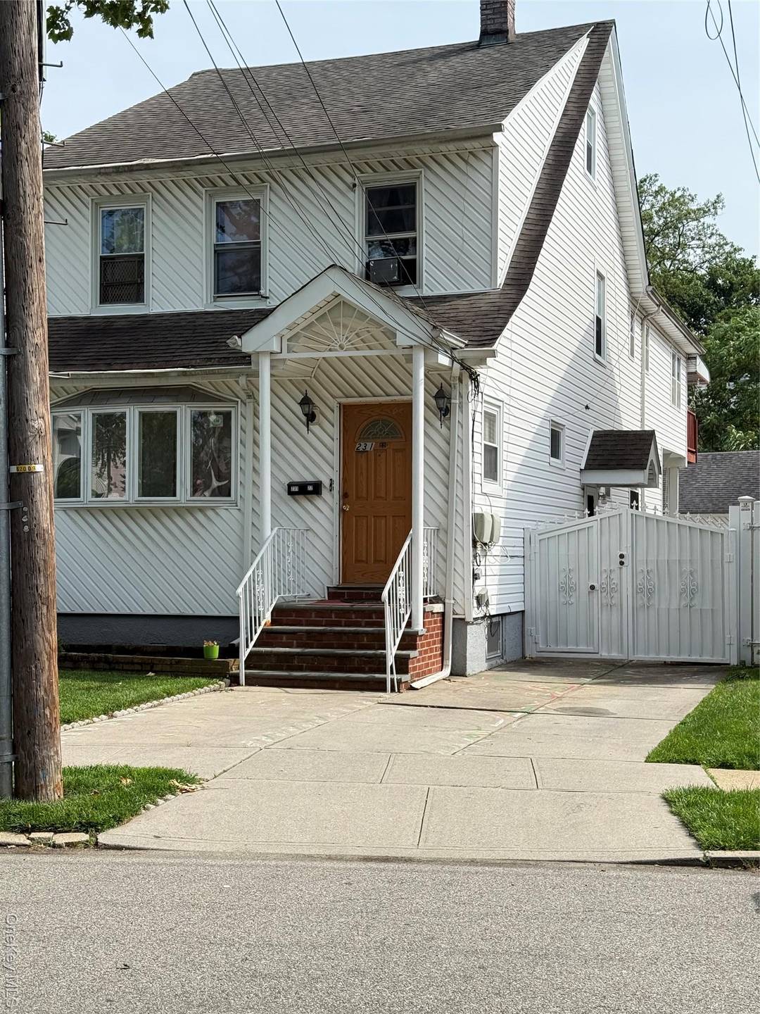 Situated in Queens Village near the Bellerose border, this two family home offers flexible living or rental possibilities.