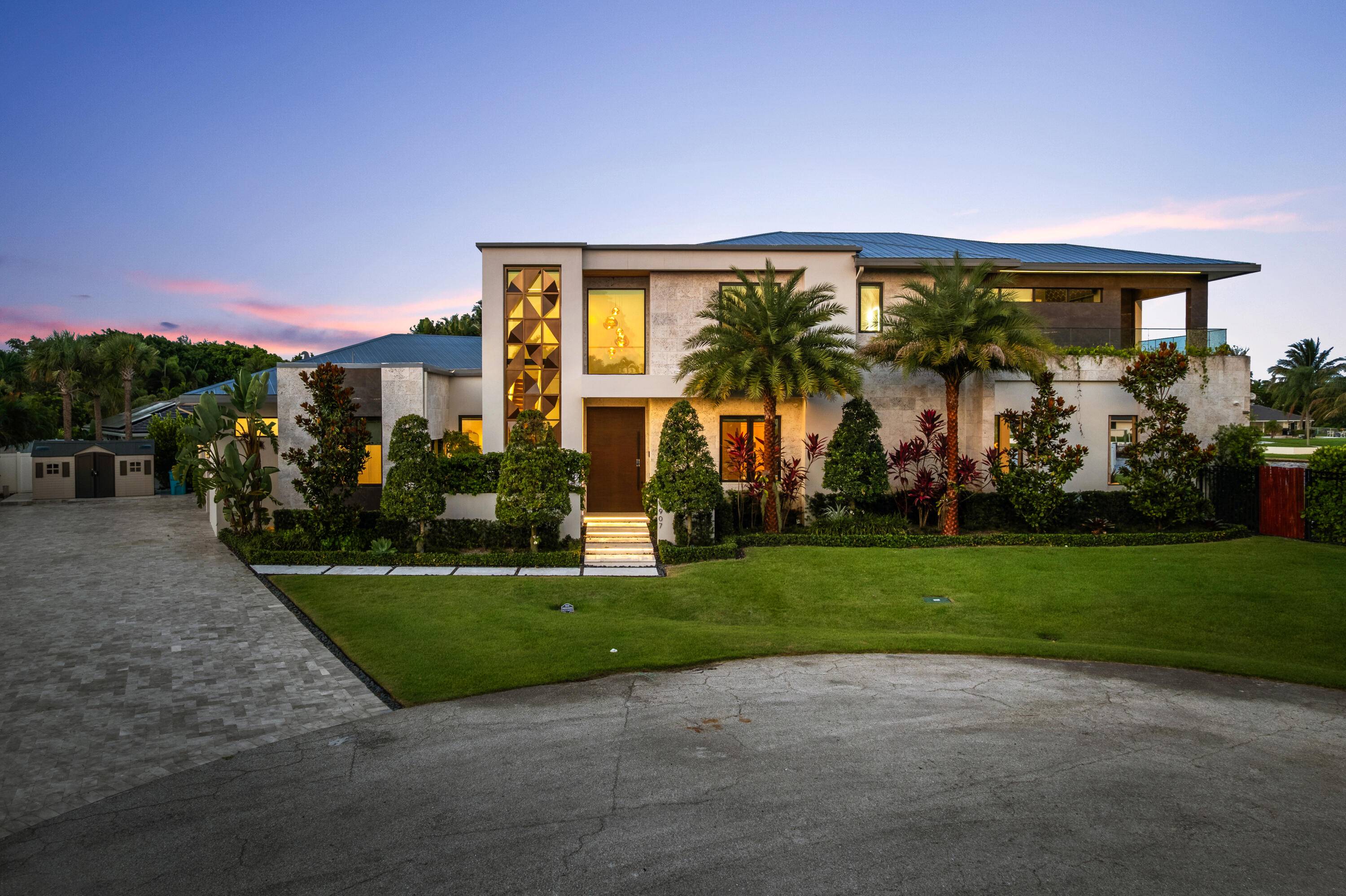 Lake Eden Masterpiece Luxury RedefinedExclusive lakefront sanctuary in a coveted non HOA community offers privacy, elegance, breathtaking east facing lake views with refreshing breezes year round.