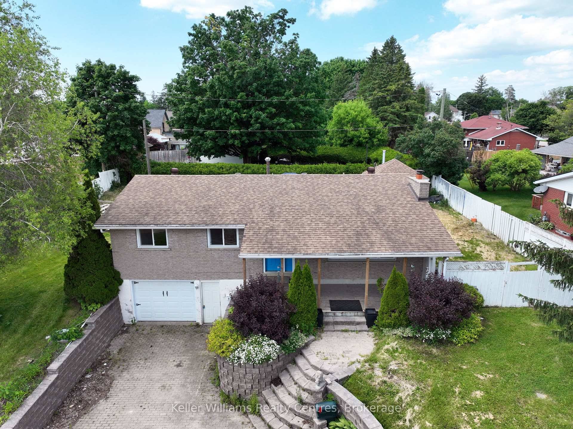 Imagine coming home to this charming raised bungalow in a quiet yet convenient neighborhood.