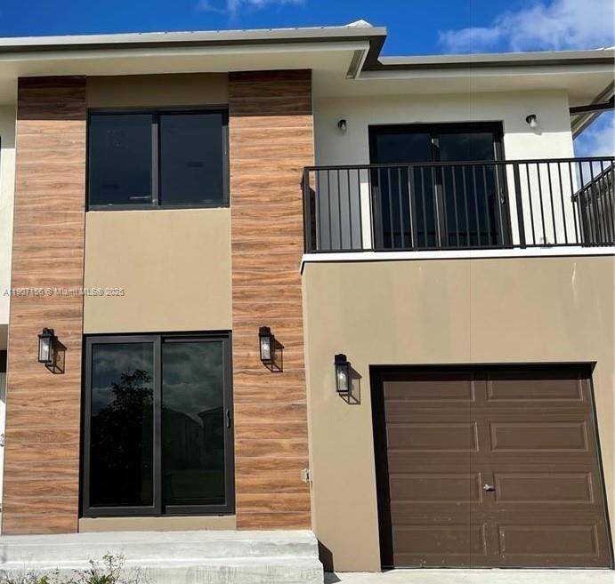 Stunning 2 story home located in a highly sought after residential community in Florida City features 5 bedrooms, 4.