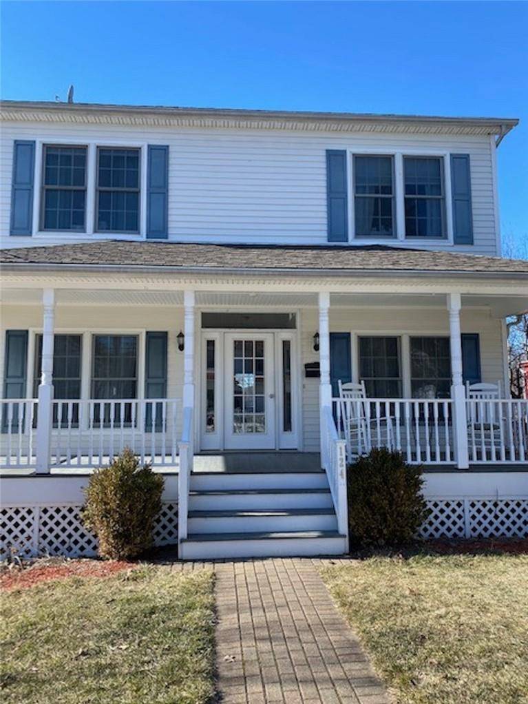 This beautiful home is nestled on a gorgeous block.