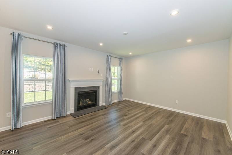 Welcome to 2 Zachary Drive, a beautiful former model Oakmont in the highly desirable Stone Water Village of Roxbury !