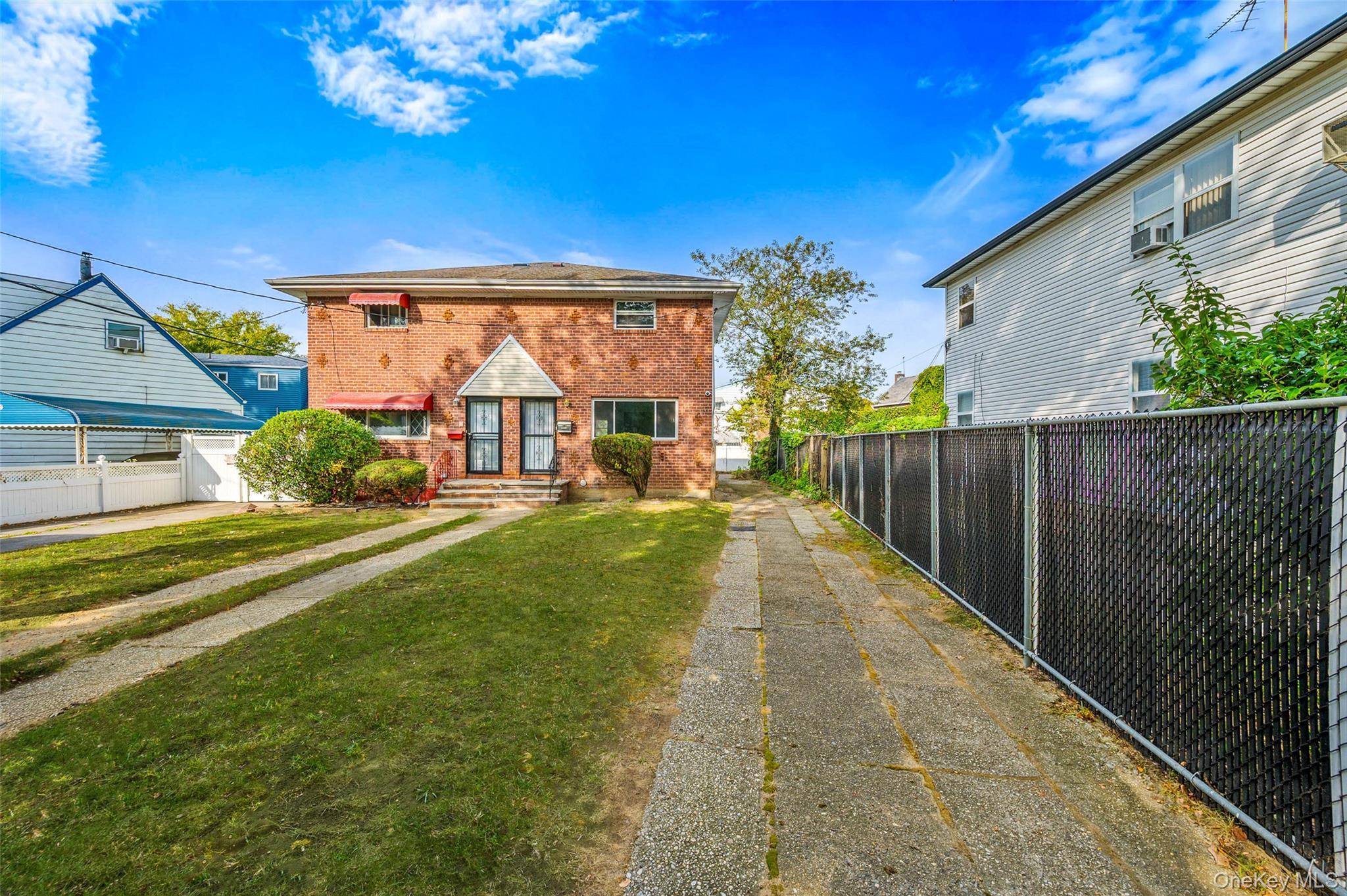 Welcome to 132 20 Farmers Boulevard, where opportunity meets convenience in the heart of St.