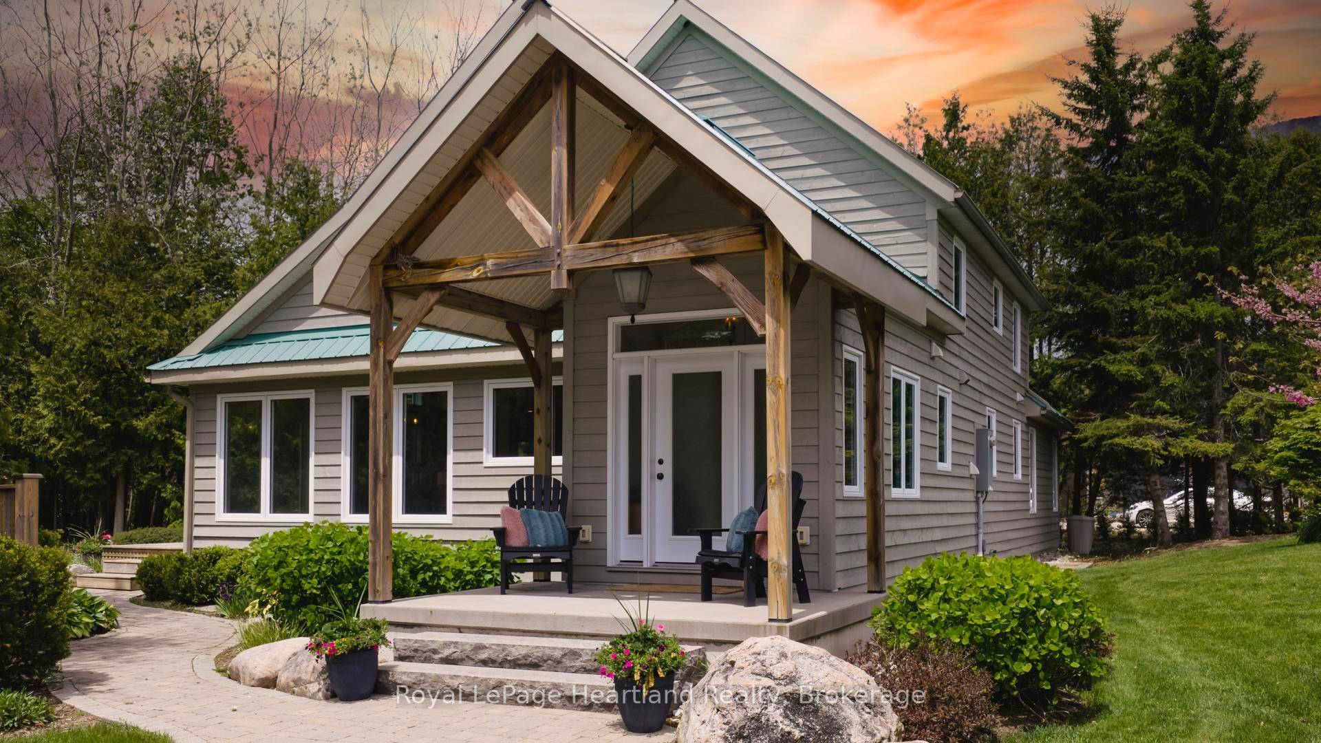LUXURY. PRIVACY. WATERFRONT Experience refined lakeside living in this one of a kind luxury estate, gracefully set on 1.