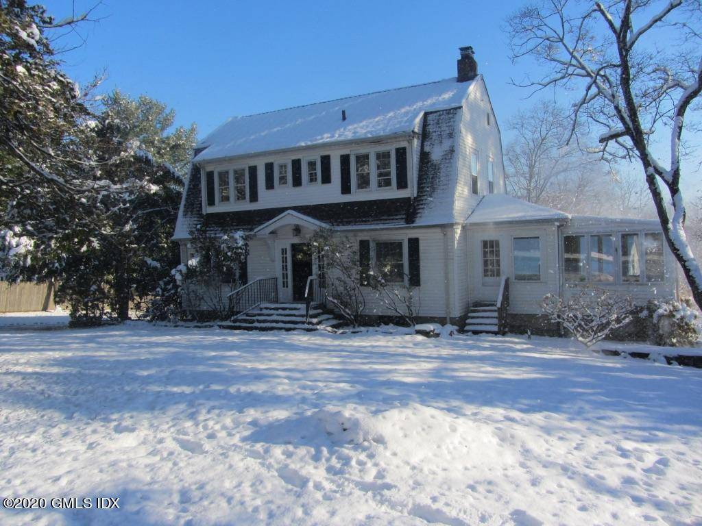 Pretty Dutch Colonial on Round Hill Road.
