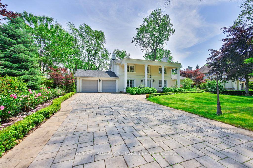 Gorgeous Family Home With In door Pool and Prof Landscaping in coveted Morrison On A 102 X 155 Ft premium Lot 15748sf or 0.