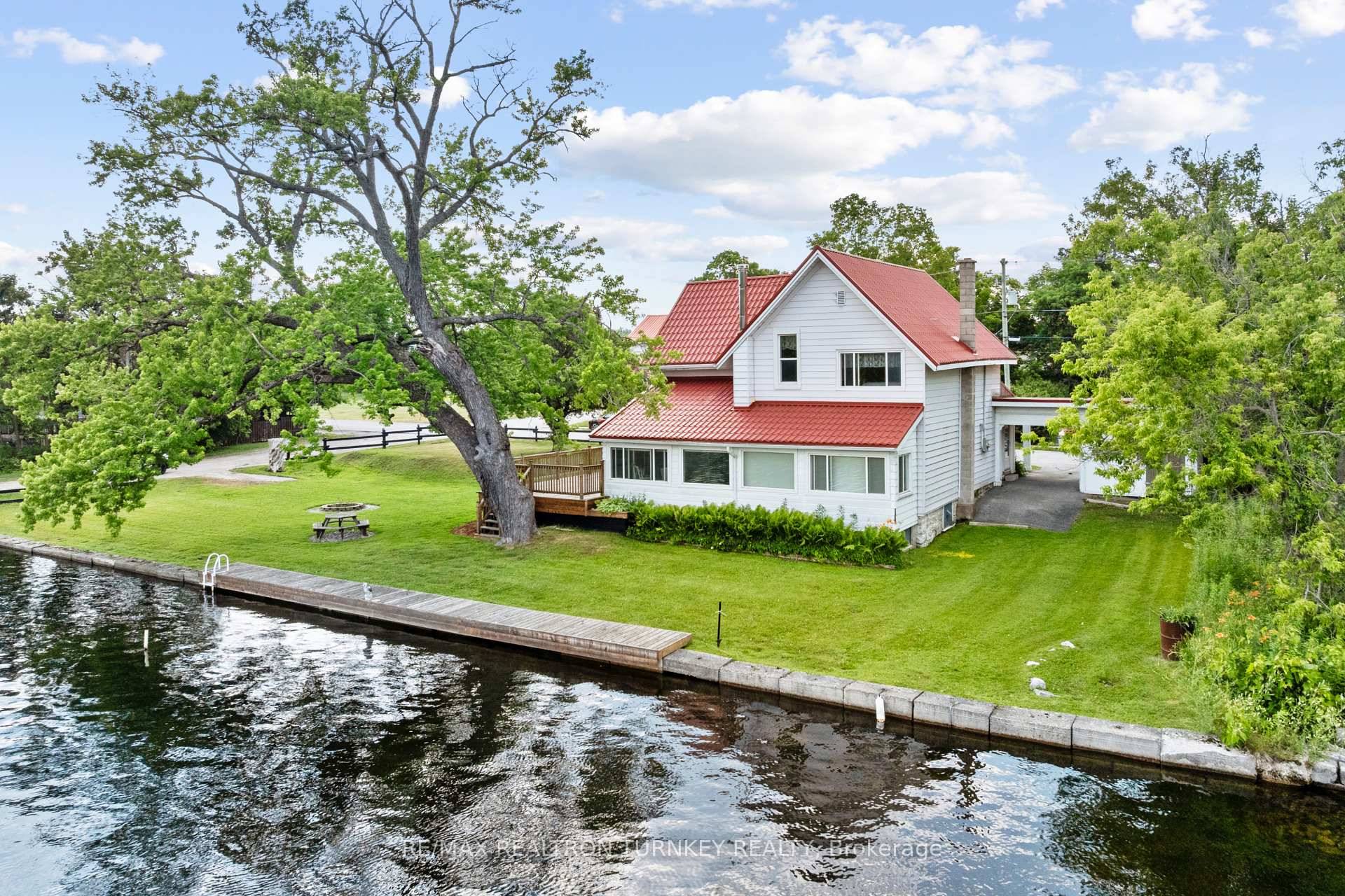 DIRECT WATERFRONT ! This charming 2, 000 sq.